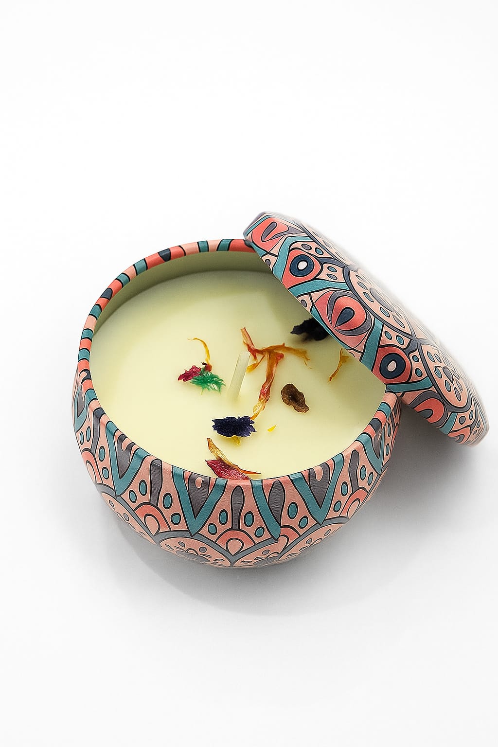 Decorative candle in a colorful holder on a white background
